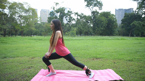 Full length of woman on field