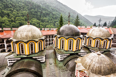 Panoramic view of temple and building against sky