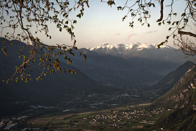 Aerial view of snowcapped mountain against sky