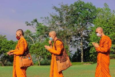 Full length of man standing on field