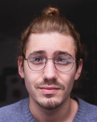Portrait of young man wearing eyeglasses