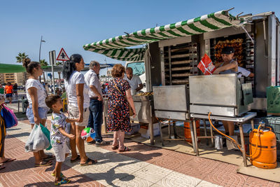 Group of people in front of building