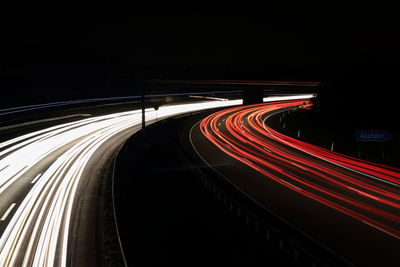 Light trails on road at night