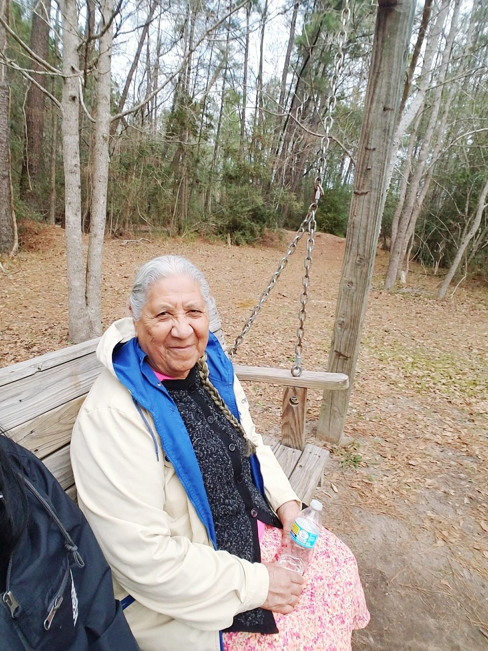 senior adult, portrait, waist up, smiling, looking at camera, white hair, senior women, happiness, gray hair, leisure activity, one person, senior men, adults only, one senior man only, people, retirement, outdoors, adult, one man only, grandparent, tree, day, only men