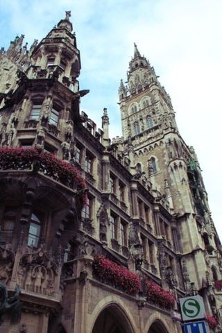 architecture, building exterior, built structure, low angle view, religion, church, place of worship, spirituality, sky, cathedral, city, history, clock tower, famous place, travel destinations, tower, window, day