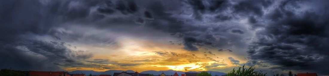 Low angle view of dramatic sky during sunset