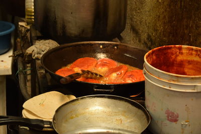 Close-up of cooking pan on barbecue grill