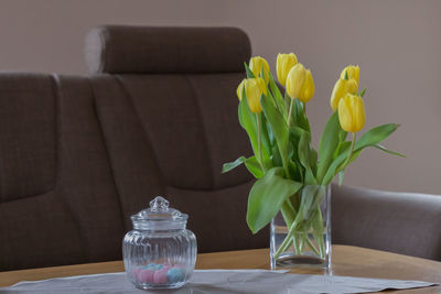 Flower vase on table at home