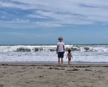 Father and daughter at beach