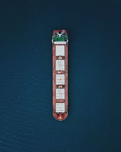 Aerial view of container ship on sea