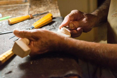 Close-up of man preparing food