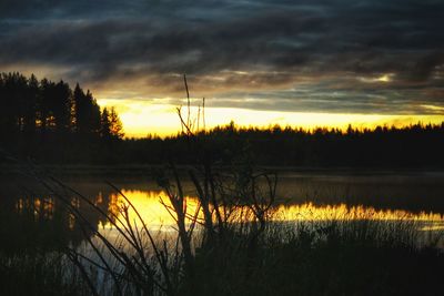 Scenic view of lake during sunset