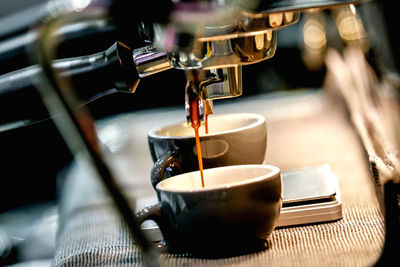 Close-up barista coffee cup