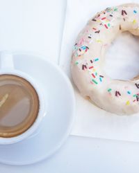 High angle view of coffee cup on table