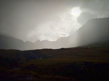 Scenic view of land against sky