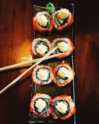 High angle view of sushi served on table