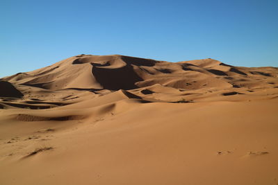 Scenic view of mountains against clear sky