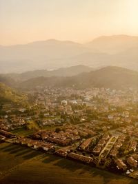 High angle view of townscape against sky during sunset