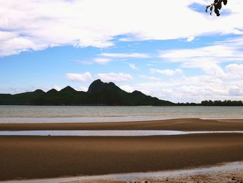 Scenic view of beach against sky