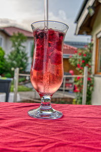 Close-up of red wine on table