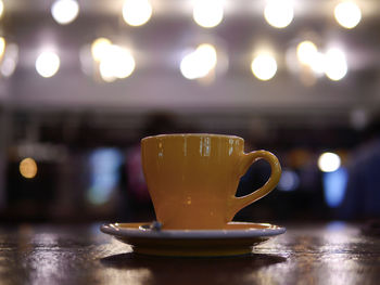 Close-up of coffee served on table at cafe