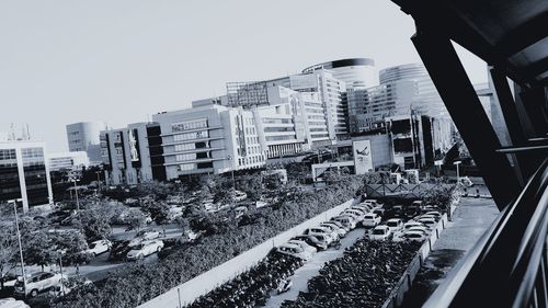 High angle view of buildings in city against sky