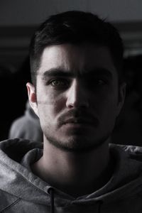 Close-up of thoughtful young man