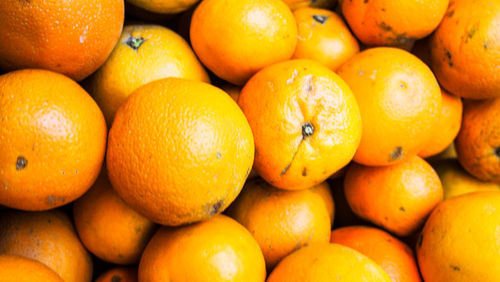 Full frame shot of oranges in market