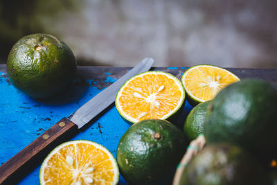 High angle view of fresh key lime fruits on table