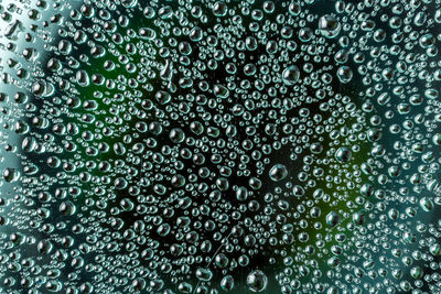 Full frame shot of wet glass