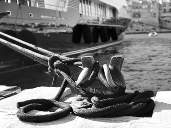 Close-up of rope tied to bollard