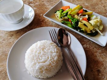 High angle view of breakfast served on table