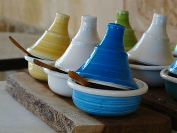 Close-up of ceramics containers on table