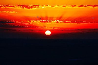 Scenic view of landscape at sunset