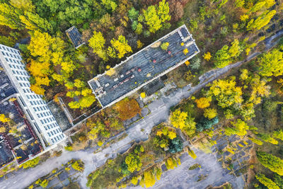 Ukraine, kyiv oblast, pripyat, aerial view of rooftops of abandoned city in autumn