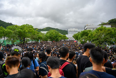 Group of people in front of buildings