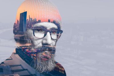 Double exposure of man and cityscape