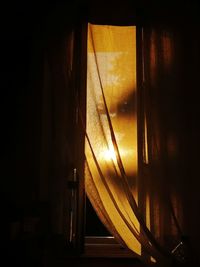 Sunlight streaming through window at night