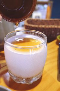 Close-up of beer in glass on table