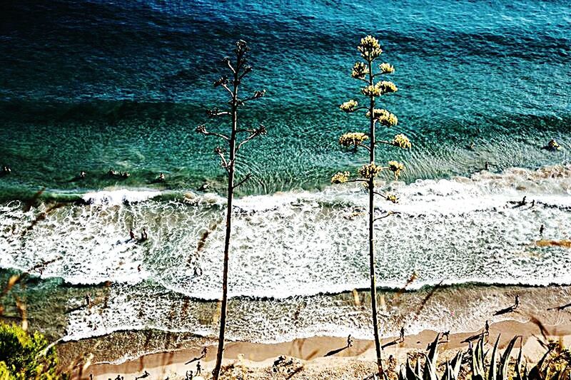 water, high angle view, sea, beach, shore, sand, sunlight, tranquility, day, nature, outdoors, shadow, rippled, elevated view, no people, wave, tranquil scene, coastline, pattern, beauty in nature