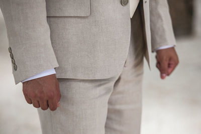 Low section of man standing on floor