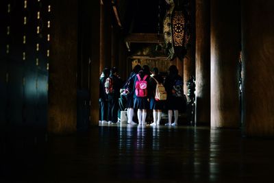 View of illuminated woman at night