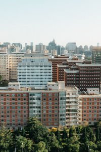 High angle view of buildings against clear sky