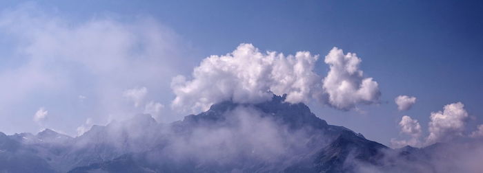 Low angle view of mountains against sky