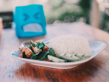 Close-up of food in plate on table