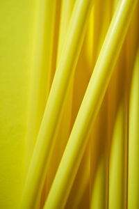 Yellow plastic on the yellow background