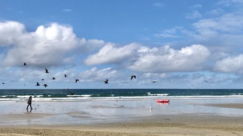 Scenic view of beach against sky