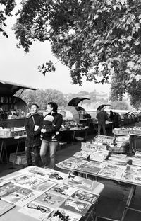 People at market stall