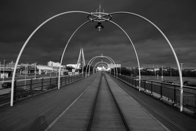 Footbridge against sky