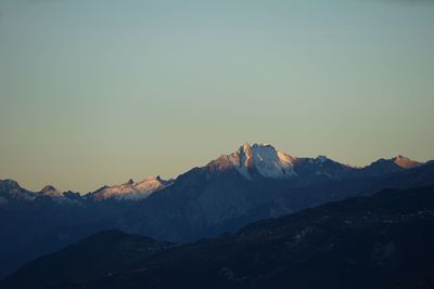 Scenic view of mountains against sky during winter